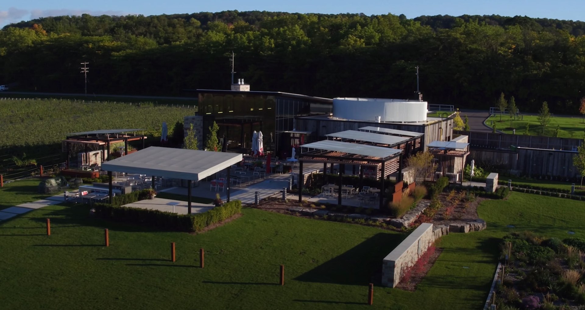 Commercial landscape design featuring modern architecture and professional grounds maintenance Modern commercial building with professional landscaping and outdoor facilities in Channelview, TX